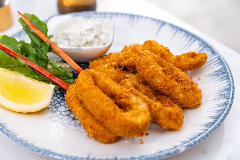 Calamari fritti lightly breaded